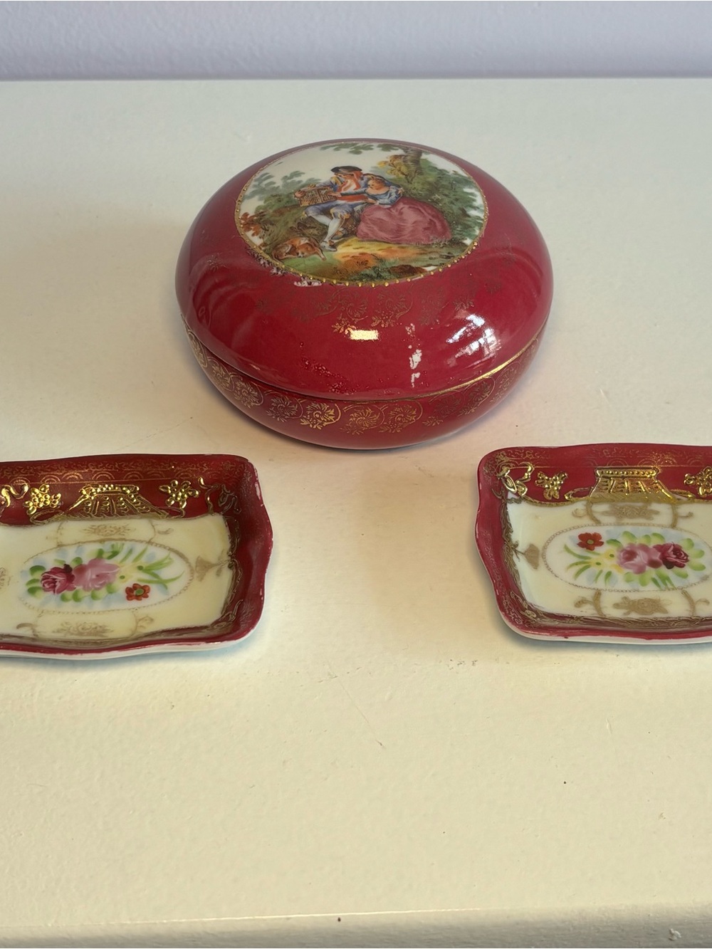 Vintage Burgundy Porcelain Trinket Box with Floral Design and Gold Details